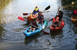 Singing Paddles Sit-on Canoes